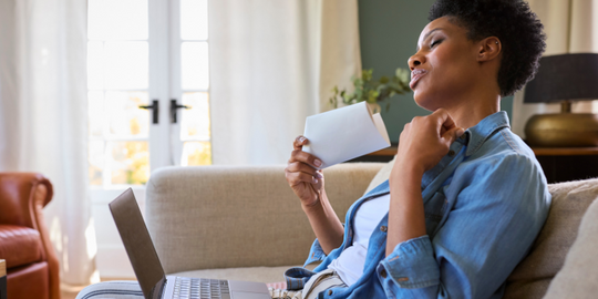 Perimenopausal woman experiencing hot flush