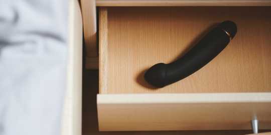 Women vibrator sex toy in bedside draw