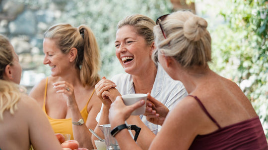 group of women laughing together