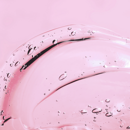 AH! YES VM vaginal moisturizer is a clear gel, image show the clear gel on a pink background.